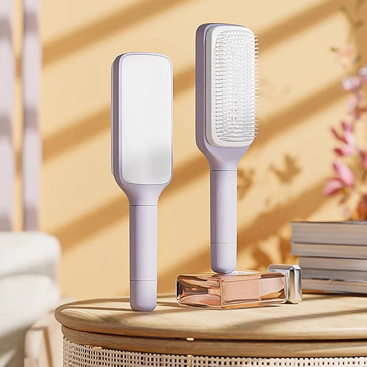 Self-Cleaning Rotating Hairbrush FlowComb